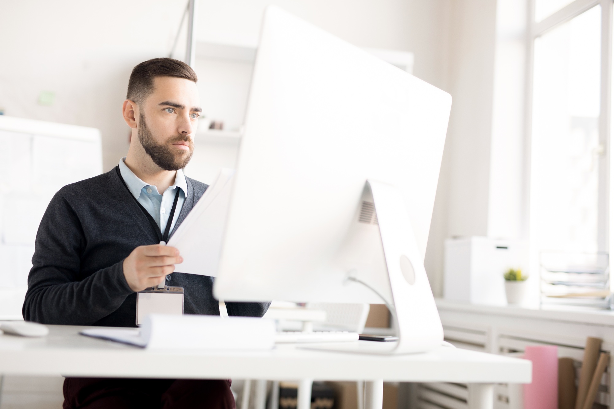 Bearded Man Using PC
